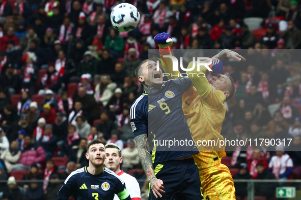 Lyndon Dykes and Lukasz Skorupski during UEFA Nations League match Poland - Scotland at National Stadium in Warsaw, Poland on November 18, 2...