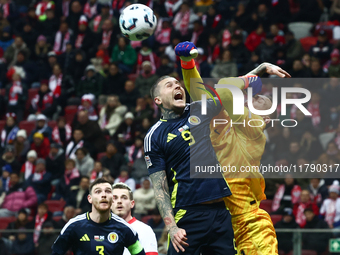 Lyndon Dykes and Lukasz Skorupski during UEFA Nations League match Poland - Scotland at National Stadium in Warsaw, Poland on November 18, 2...