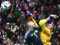 Lyndon Dykes and Lukasz Skorupski during UEFA Nations League match Poland - Scotland at National Stadium in Warsaw, Poland on November 18, 2...