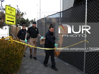 Crime scene investigators with the NYPD collect evidence and guard the scene after a 68-year-old man who is fishing is fatally stabbed multi...