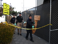 Crime scene investigators with the NYPD collect evidence and guard the scene after a 68-year-old man who is fishing is fatally stabbed multi...