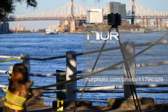 Crime scene investigators with the NYPD collect evidence and guard the scene after a 68-year-old man who is fishing is fatally stabbed multi...