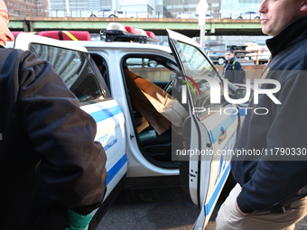 Crime scene investigators with the NYPD collect evidence and guard the scene after a 68-year-old man who is fishing is fatally stabbed multi...