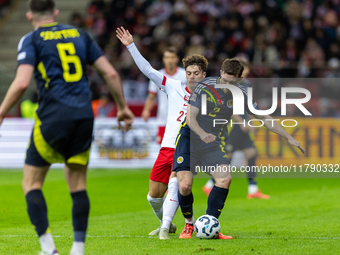 Nicola Zalewski (L) and Anthony Ralston are playing during the  UEFA Nations League 2024 League A Group A1 match between Poland and Scotland...