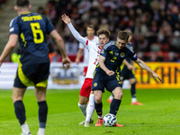 Nicola Zalewski (L) and Anthony Ralston are playing during the  UEFA Nations League 2024 League A Group A1 match between Poland and Scotland...