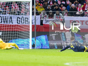 Lukasz Skorupski , Scott McTominay  during UEFA Nations League match Poland vs Scotland in Warsaw Poland on 18 November 2024. (