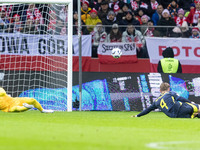 Lukasz Skorupski , Scott McTominay  during UEFA Nations League match Poland vs Scotland in Warsaw Poland on 18 November 2024. (