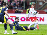 John Souttar , Anthony Ralston , Nicola Zalewski  during UEFA Nations League match Poland vs Scotland in Warsaw Poland on 18 November 2024....