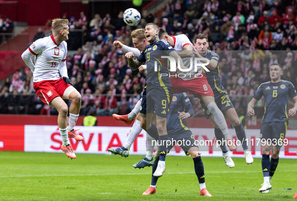 Karol Swiderski , Lyndon Dykes , Jakub Moder  during UEFA Nations League match Poland vs Scotland in Warsaw Poland on 18 November 2024. 