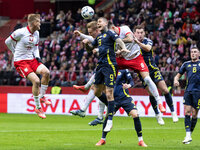 Karol Swiderski , Lyndon Dykes , Jakub Moder  during UEFA Nations League match Poland vs Scotland in Warsaw Poland on 18 November 2024. (