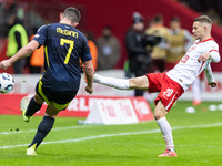 John McGinn , Sebastian Szymanski  during UEFA Nations League match Poland vs Scotland in Warsaw Poland on 18 November 2024. (