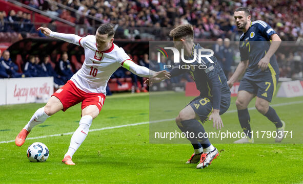 Piotr Zielinski , Billy Gilmour , John McGinn  during UEFA Nations League match Poland vs Scotland in Warsaw Poland on 18 November 2024. 