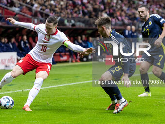 Piotr Zielinski , Billy Gilmour , John McGinn  during UEFA Nations League match Poland vs Scotland in Warsaw Poland on 18 November 2024. (