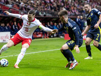 Piotr Zielinski , Billy Gilmour , John McGinn  during UEFA Nations League match Poland vs Scotland in Warsaw Poland on 18 November 2024. (