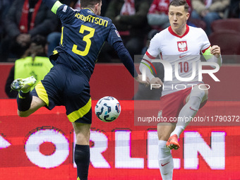 Andy Robertson , Piotr Zielinski  during UEFA Nations League match Poland vs Scotland in Warsaw Poland on 18 November 2024. (