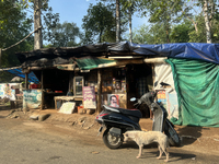 Shops line the roadside in Konni, Pathanamthitta, Kerala, India, on April 5, 2024. (