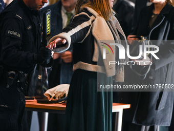 KRAKOW, POLAND - NOVEMBER 17:   
Participants undergo security clearance ahead of the Jubilee Gala celebrating the 35th anniversary of the S...