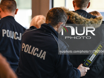 KRAKOW, POLAND - NOVEMBER 17:   
Participants undergo security clearance ahead of the Jubilee Gala celebrating the 35th anniversary of the S...