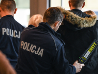 KRAKOW, POLAND - NOVEMBER 17:   
Participants undergo security clearance ahead of the Jubilee Gala celebrating the 35th anniversary of the S...