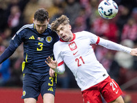 Andy Robertson , Nicola Zalewski , goal during UEFA Nations League match Poland vs Scotland in Warsaw Poland on 18 November 2024. (