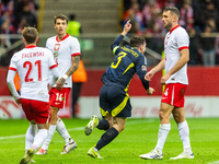 Andy Robertson is celebrating  scoring the winning goal during the UEFA Nations League 2024 Group A A1 match between Poland and Scotland at...