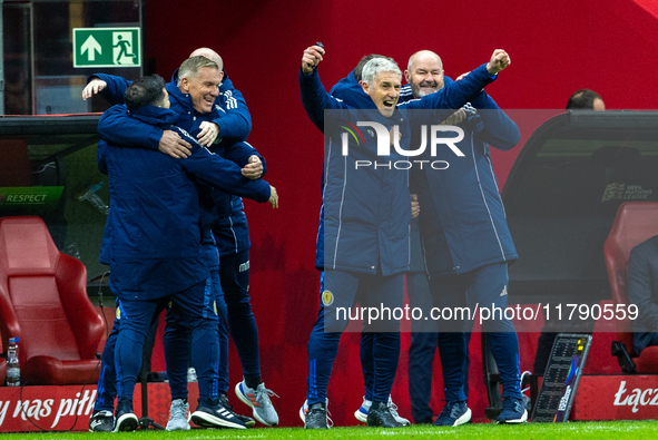 Steve Clarke (R) and coaching staff are celebrating  victory during the UEFA 2024 UEFA Nations League Group A1 football match between Poland...