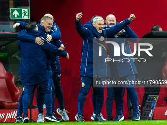 Steve Clarke (R) and coaching staff are celebrating  victory during the UEFA 2024 UEFA Nations League Group A1 football match between Poland...