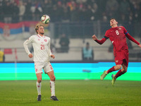 Morten Hjulmand of Denmark and Andrija Maksimovic of Serbia battle for the ball during the Nations League Round 6 match between Serbia qnd D...