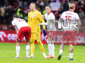 Jakub Kiwior , Lukasz Skorupski , Piotr Zielinski , Tymoteusz Puchacz  during UEFA Nations League match Poland vs Scotland in Warsaw Poland...