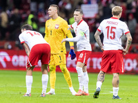 Jakub Kiwior , Lukasz Skorupski , Piotr Zielinski , Tymoteusz Puchacz  during UEFA Nations League match Poland vs Scotland in Warsaw Poland...