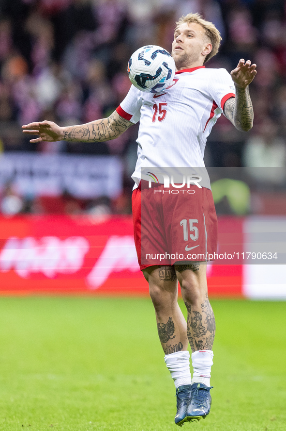 Tymoteusz Puchacz , Anthony Ralston  during UEFA Nations League match Poland vs Scotland in Warsaw Poland on 18 November 2024. 