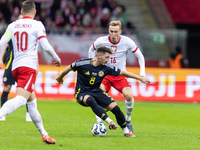 Piotr Zielinski , Billy Gilmour , Adam Buksa  during UEFA Nations League match Poland vs Scotland in Warsaw Poland on 18 November 2024. (