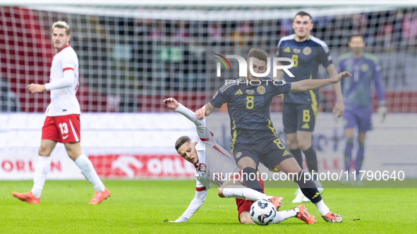 Sebastian Szymanski , Billy Gilmour  during UEFA Nations League match Poland vs Scotland in Warsaw Poland on 18 November 2024. 