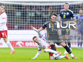 Sebastian Szymanski , Billy Gilmour  during UEFA Nations League match Poland vs Scotland in Warsaw Poland on 18 November 2024. (