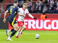 Grant Hanley , Karol Swiderski  during UEFA Nations League match Poland vs Scotland in Warsaw Poland on 18 November 2024. (