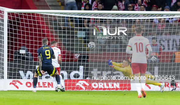 Lyndon Dykes , Sebastian Walukiewicz , Lukasz Skorupski , Piotr Zielinski  during UEFA Nations League match Poland vs Scotland in Warsaw Pol...