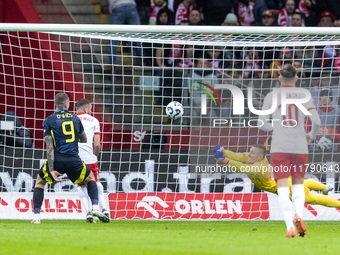 Lyndon Dykes , Sebastian Walukiewicz , Lukasz Skorupski , Piotr Zielinski  during UEFA Nations League match Poland vs Scotland in Warsaw Pol...