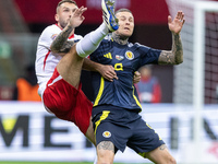 Sebastian Walukiewicz , Lyndon Dykes  during UEFA Nations League match Poland vs Scotland in Warsaw Poland on 18 November 2024. (