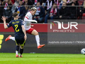 Anthony Ralston , Jakub Kaminski  during UEFA Nations League match Poland vs Scotland in Warsaw Poland on 18 November 2024. (