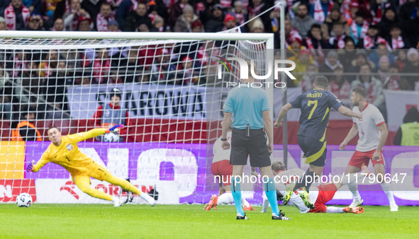 Lukasz Skorupski , John McGinn , goal during UEFA Nations League match Poland vs Scotland in Warsaw Poland on 18 November 2024. 