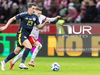 Kenny McLean , Sebastian Szymanski  during UEFA Nations League match Poland vs Scotland in Warsaw Poland on 18 November 2024. (