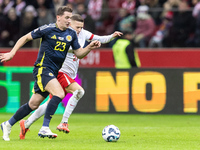 Kenny McLean , Sebastian Szymanski  during UEFA Nations League match Poland vs Scotland in Warsaw Poland on 18 November 2024. (