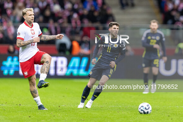 Tymoteusz Puchacz , Ryan Christie  during UEFA Nations League match Poland vs Scotland in Warsaw Poland on 18 November 2024. 