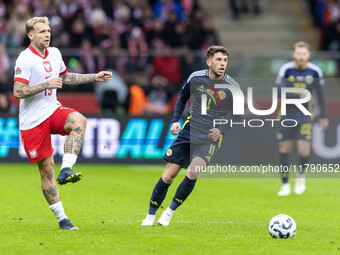 Tymoteusz Puchacz , Ryan Christie  during UEFA Nations League match Poland vs Scotland in Warsaw Poland on 18 November 2024. (