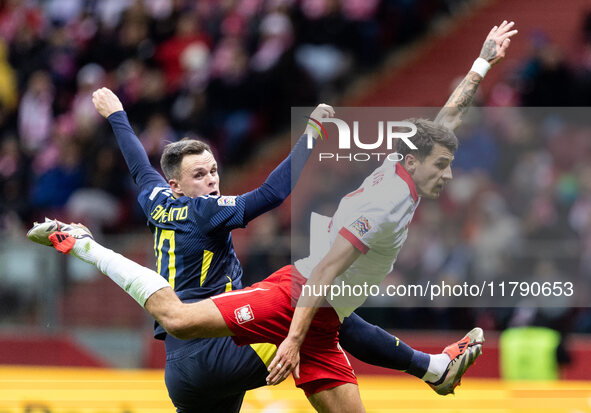 Lawrence Shankland , Jakub Kiwior  during UEFA Nations League match Poland vs Scotland in Warsaw Poland on 18 November 2024. 