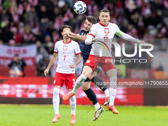 Billy Gilmour , Piotr Zielinski  during UEFA Nations League match Poland vs Scotland in Warsaw Poland on 18 November 2024. (