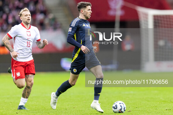 Tymoteusz Puchacz , Ryan Christie  during UEFA Nations League match Poland vs Scotland in Warsaw Poland on 18 November 2024. 