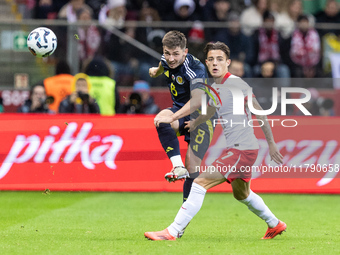 Billy Gilmour , Kacper Urbanski  during UEFA Nations League match Poland vs Scotland in Warsaw Poland on 18 November 2024. (