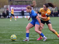 Lily Crosthwaite of Durham Women competes with London City Lionesses' Cerys Brown during the FA Women's Championship match between Durham Wo...