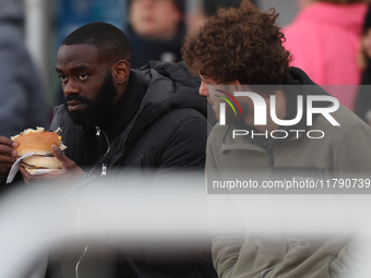 Hartlepool United's Manny Onariase and Anthony Mancini sit in the stands watching the FA Women's Championship match between Durham Women FC...